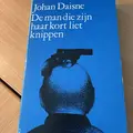 Omslag van De man die zijn haar kort liet knippen